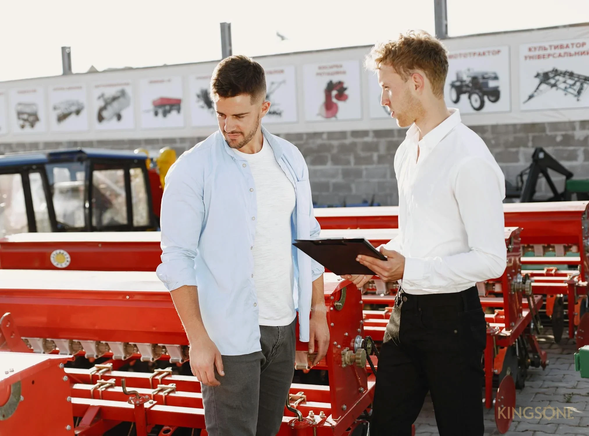 Commercial team reviewing packaging machinery